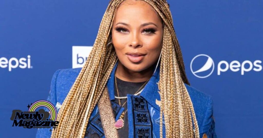 A singer in a blue jacket with long braids, captivating the audience. Who is Eva Marcille?