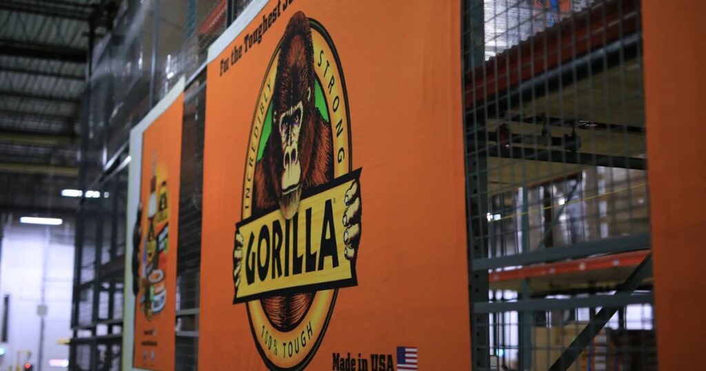 A large orange banner displaying the word "aloha," symbolizing warmth and welcome, associated with Gorilla Glue Company.