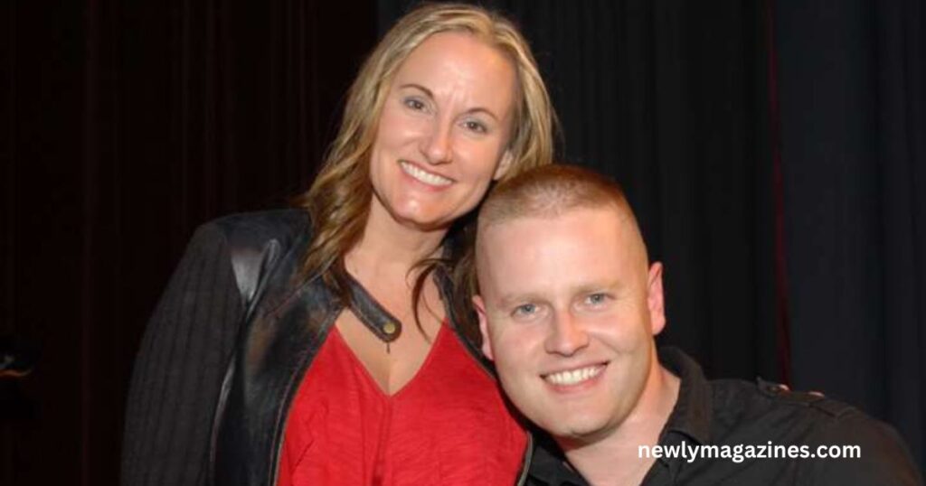 A man and woman smiling together at a party, showcasing a joyful moment, with the man identified as Georgete Jones' husband